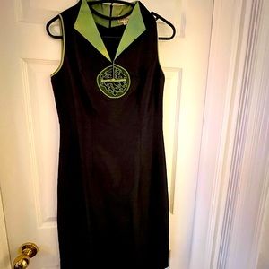 Imported 100% Pure Silk fitted dress. Black with green embroidery and detailing.